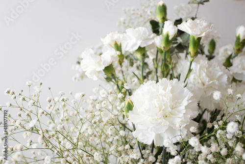 Bouquet of white flowers gypsophiles and carnations