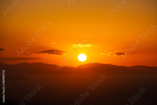 Sun setting on a mountain horizon at the Basque Country.