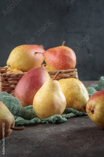 Various pears on a dark background