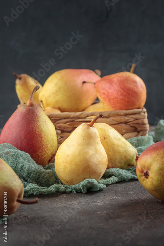 Various pears on a dark background
