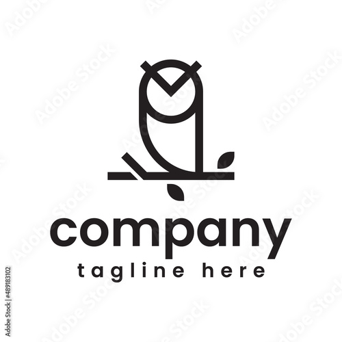 owl on tree branch logo design photo