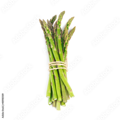 Delicious green spears. High angle shot of a bundle of green asparagus against a white background.