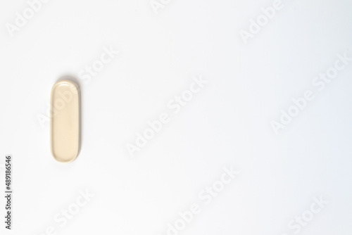Porcelain chopstick rest on a white background