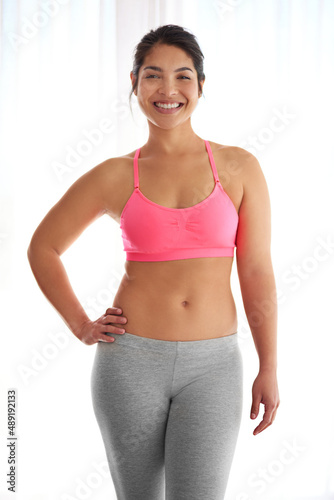 Healthy body, healthy mind. Cropped shot of a young woman in exercise clothing against a white background. © Cecilie Skjold Wackerhausen/peopleimages.com