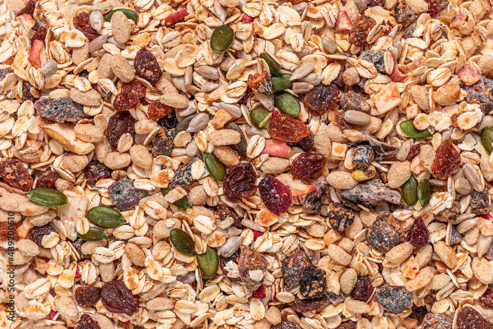 Oat flakes wallpaper with Nuts, seeds and dried fruits. Muesli  Pattern.
