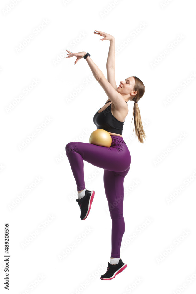 Slender girl gymnast in black sportswear with Isolated on a white background.