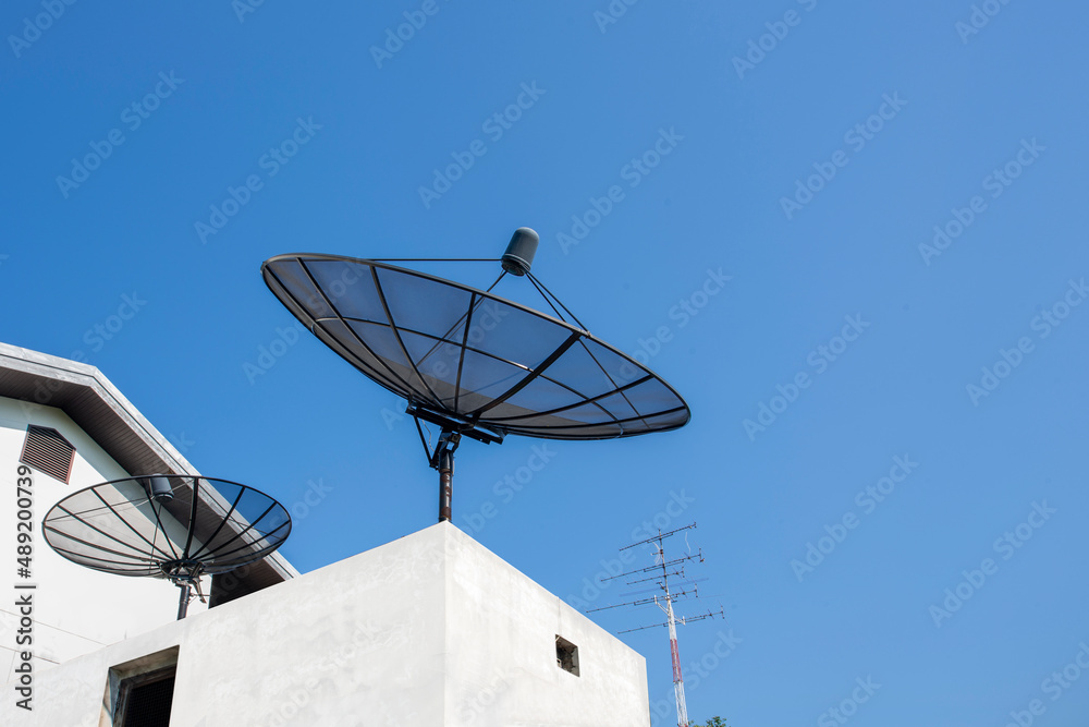 Satellite dish with blue sky and cloud background Satellite dish with blue sky and cloud background