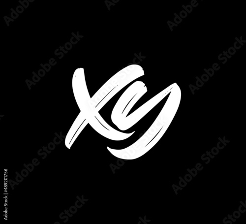 White Vector Letters Logo Brush Handlettering Calligraphy Style In Black Background Initial xy photo