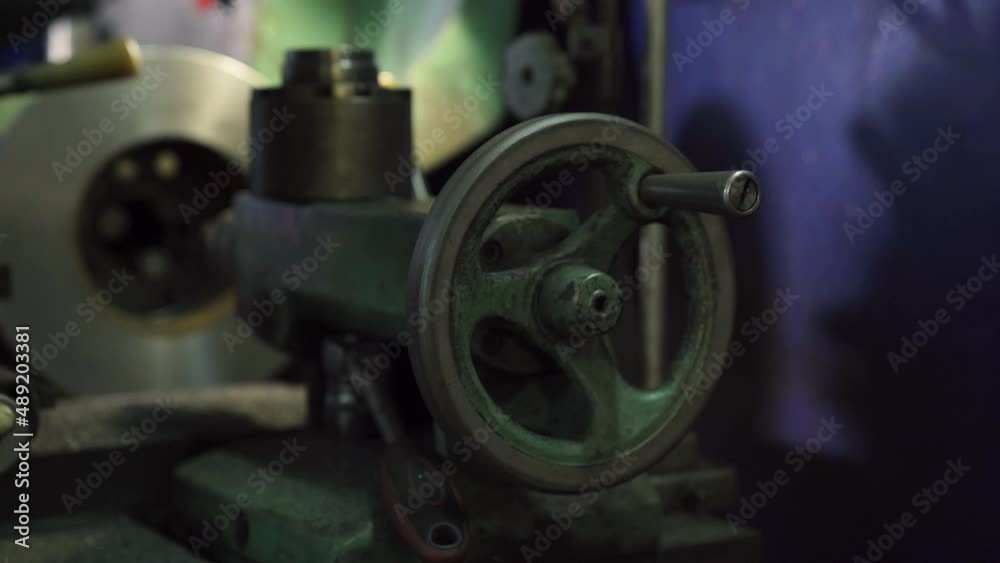 Worker Clamps In The Vise Of A Lathe Worker Clamps In The Vise Of A Lathe