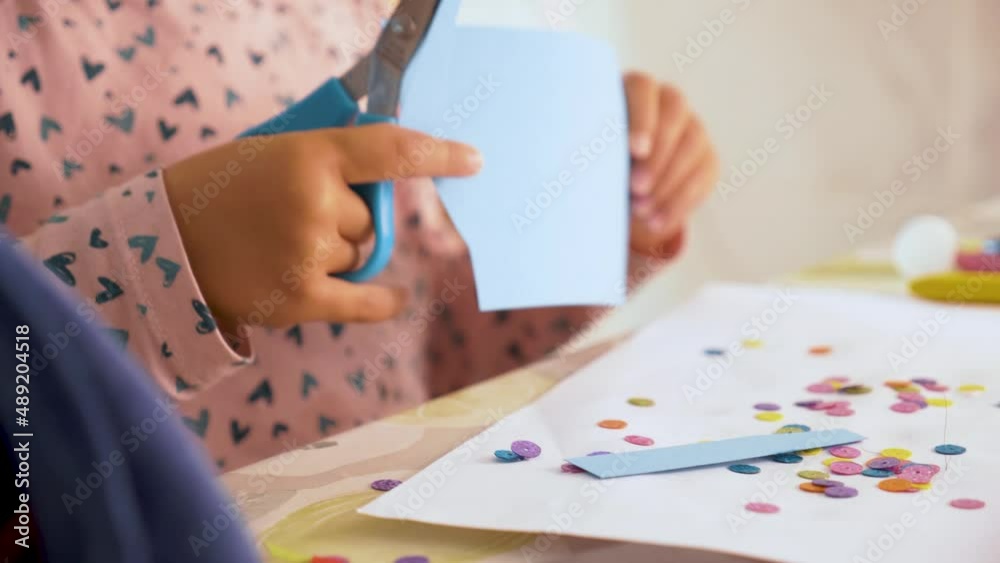 Toddler cutting with scissors and doing crafts Toddler cutting with scissors and doing crafts