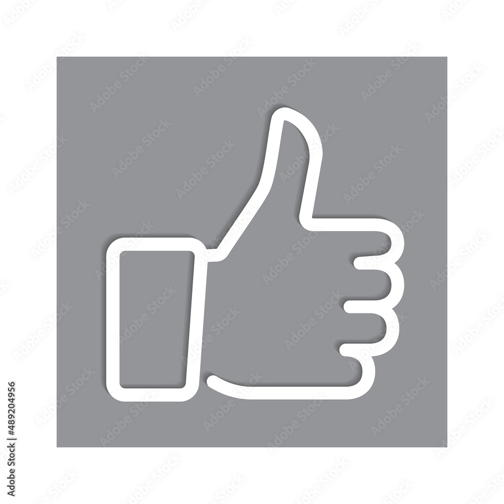 Thumbs up with shadows on a gray background Thumbs up with shadows on a gray background