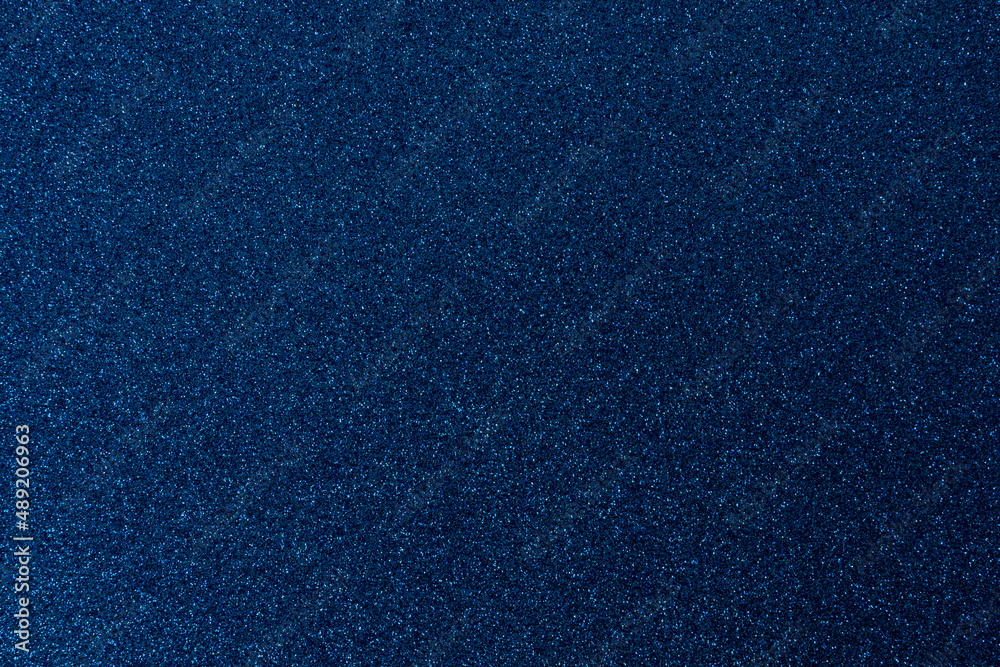 Fototapeta premium Dark blue, shiny and glittering surface. Abstract background. Events, celebrations. Trendy backdrop for your design. Texture with glitter.