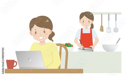 料理代行スタッフに料理を任せてリモートワークする女性