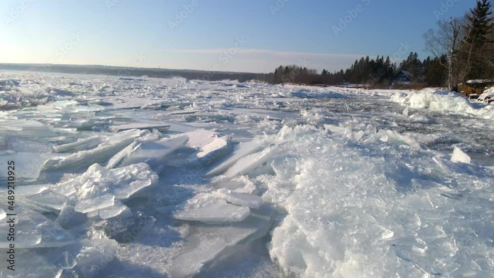 A lot of ice formations on water surface, winter icebergs frozen ocean A lot of ice formations on water surface, winter icebergs frozen ocean