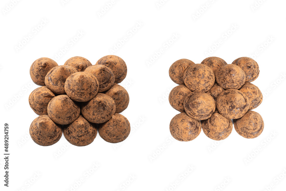 Chocolate truffles isolated on a white background. Chocolate truffles isolated on a white background.