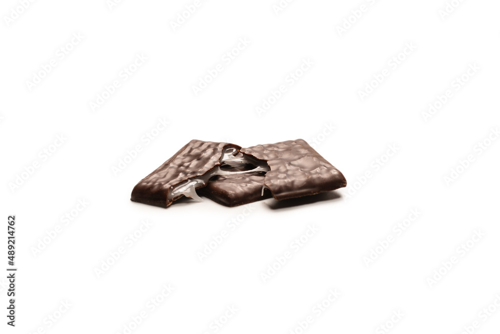 Dark chocolate candies isolated on white background. Dark chocolate candies isolated on white background.