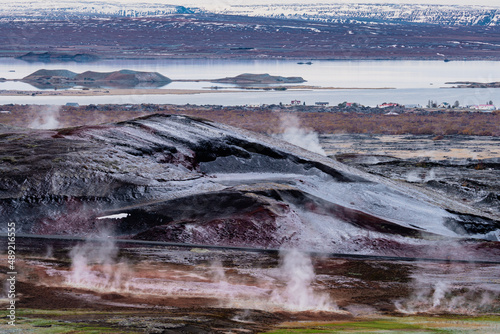 Myvatn lake with many fumaroles and residential houses