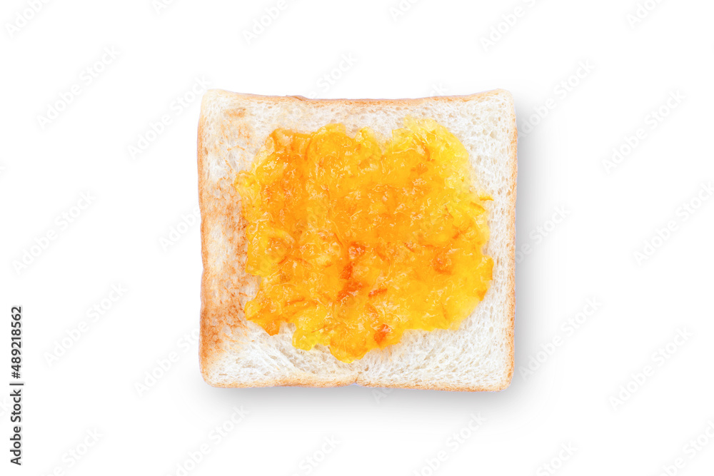 Toast sliced bread with orange jam isolated on white background. Top view. Flat lay. Clipping path.