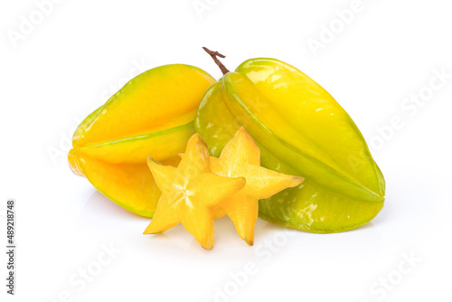 Fresh carambola fruit (Starfruit, star apple) with cut sliced isolated on white background.