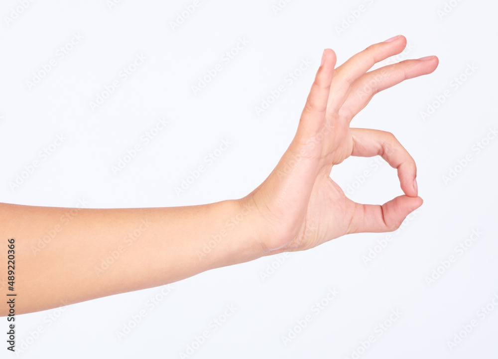 All is a-okay. Cropped image of a hand giving the okay sign. All is a-okay. Cropped image of a hand giving the okay sign.
