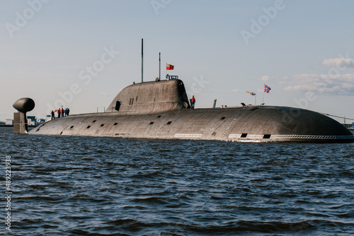 View from the water of nuclear submarines in the waters of the Gulf of Finland.Preparation for the military parade on the Day of the Navy in Kronstadt.A missile submarine.Russia,Kronstadt,30.07.2021