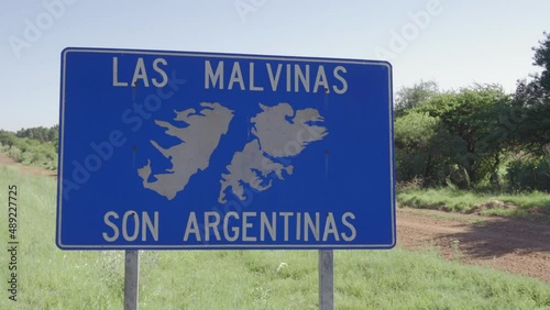 Sign saying that Falklands belong to Argentina. Close up, gimbal photo