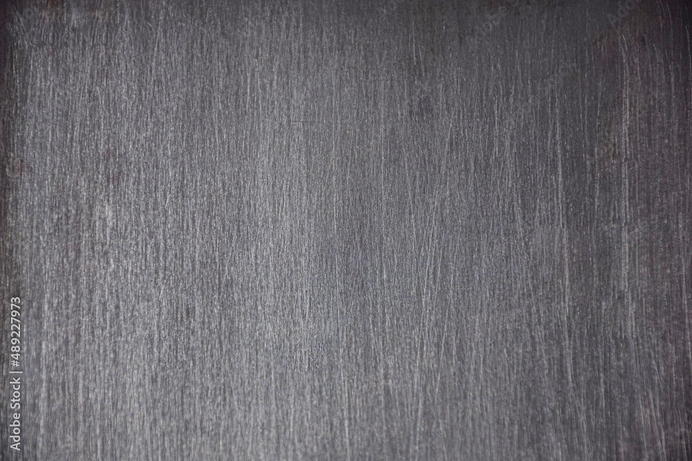 metal surface before being polished has uneven surface, merged pattern gray and black interspersed Assemble the background