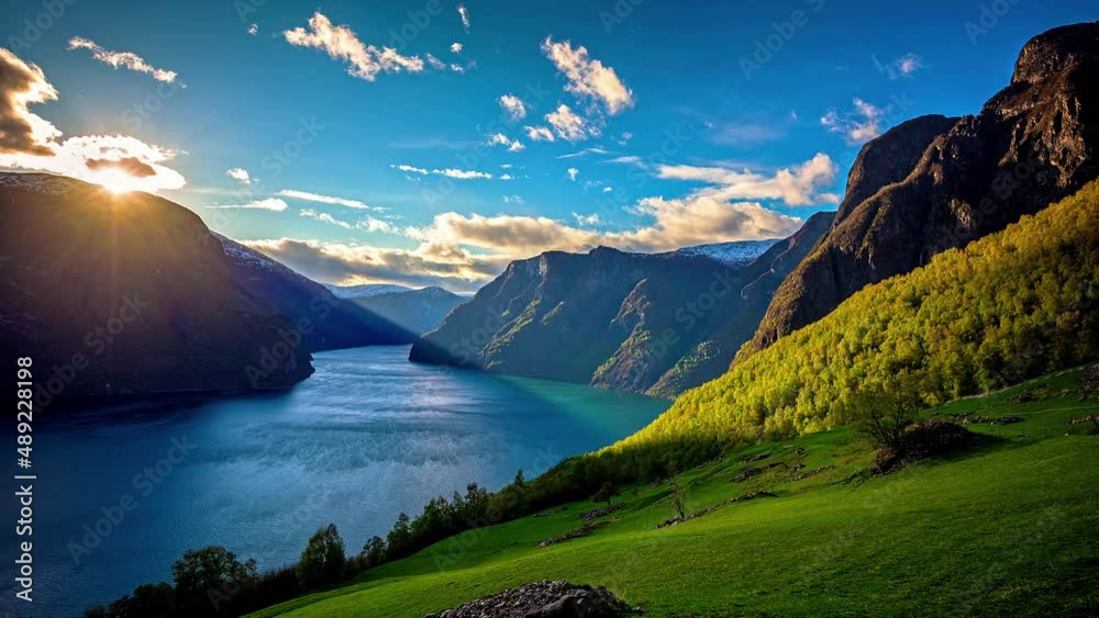 Sunset time lapse over dramatic fjord landscape, epic beauty ; Flam, Norway