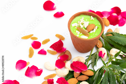 Special Indian Beverage Called Shahi Bhaang Thandai is Cannabis Infused Cooling Drink Made Of Bhang, Milk, Soaked In Dry Fruits Like Almonds Badam Pista Aniseed Rose Petals