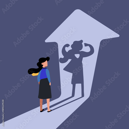 Business flat style drawing businesswoman standing in front of her own muscular shadow showing her super inner strength or superhero. Self confidence. Future goal. Cartoon graphic vector illustration