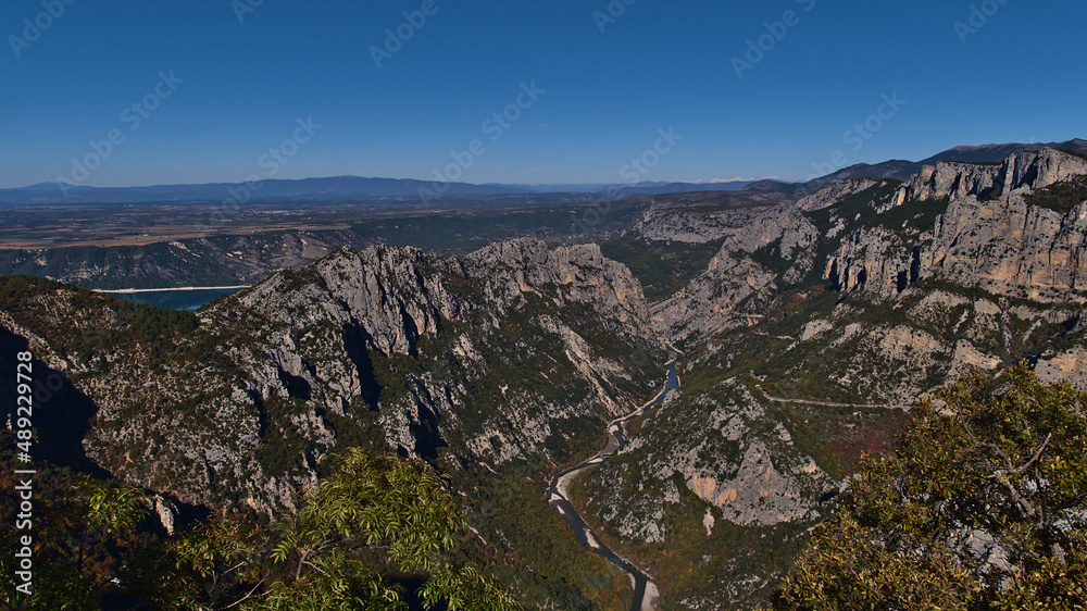 Stunning panoramic view over the western part of majestic canyon Verdon Gorge (Gorges du Verdon) in Provence region, southern France on sunny day.