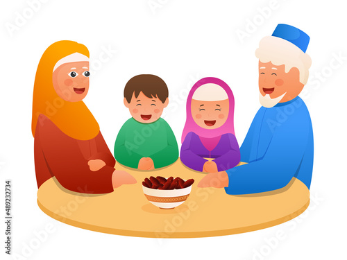 Islamic Family Together At Dining Table With Bowl Full Of Dates Against White Background.