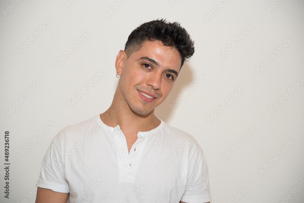 nice guy, dark-haired, white test, white t-shirt, looking straight ahead, neutral background nice guy, dark-haired, white test, white t-shirt, looking straight ahead, neutral background