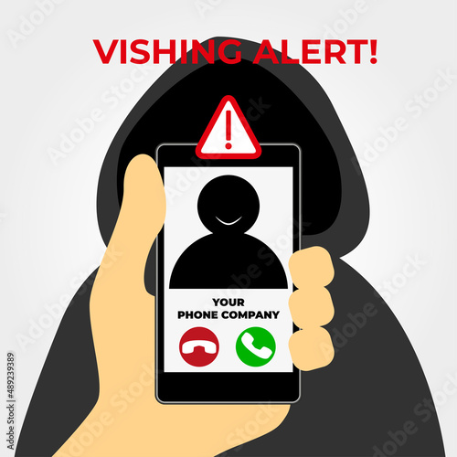 Vishing concept. Hand holding a cell phone with an incoming call in which a scammer is hiding. Danger fraud