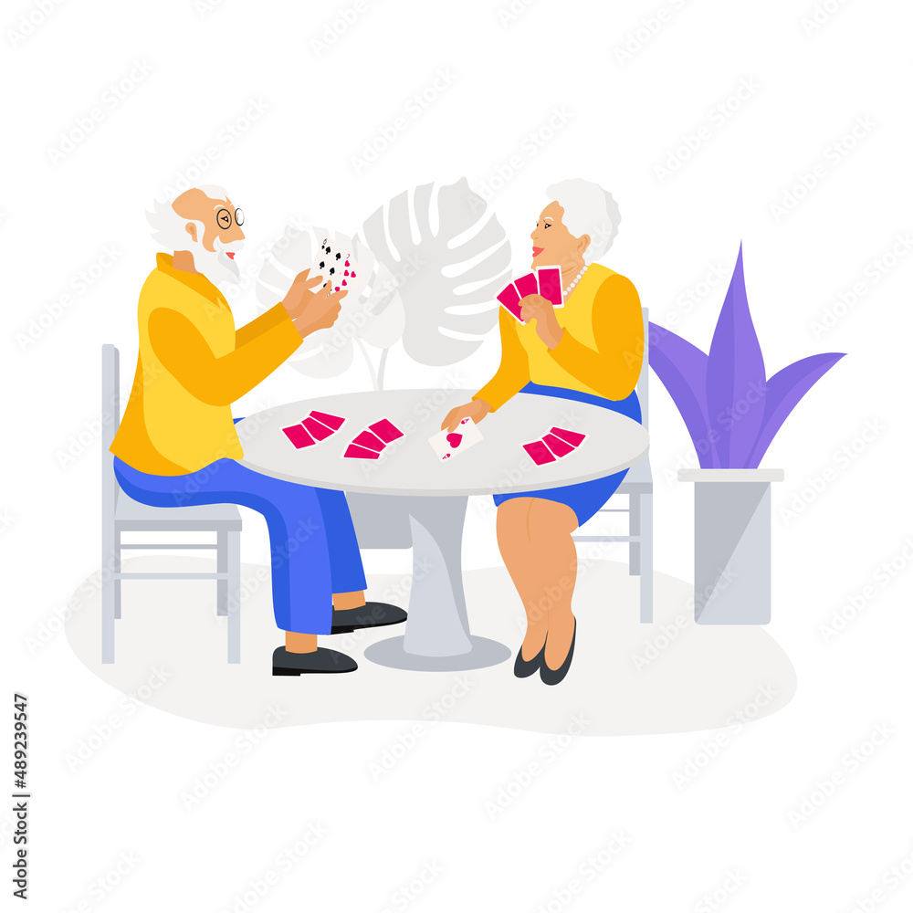 Elderly people are sitting at the table. Pensioners play cards. Elderly people are sitting at the table. Pensioners play cards.