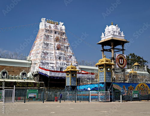 Crowd less image of Tirumala Tirupati temple with clear blue sky background.
