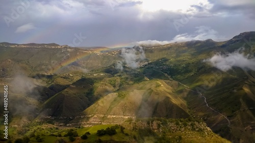 Fototapeta Naklejka Na Ścianę i Meble -  fog in the rural mountainous area of Dagestan with a view of the mountain peaks