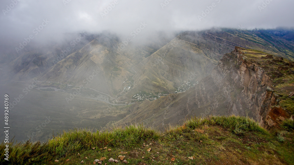 fog in the rural mountainous area of Dagestan with a view of the mountain peaks