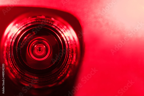 Camera lens with red backlight. Optics