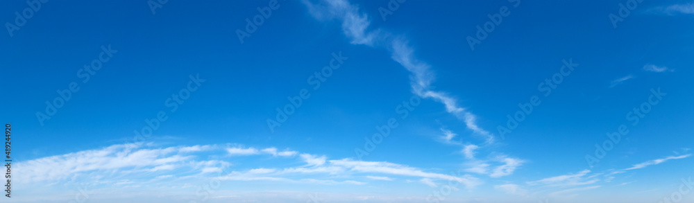 Panorama Blue sky and white clouds. Bfluffy cloud in the blue sky background Panorama Blue sky and white clouds. Bfluffy cloud in the blue sky background