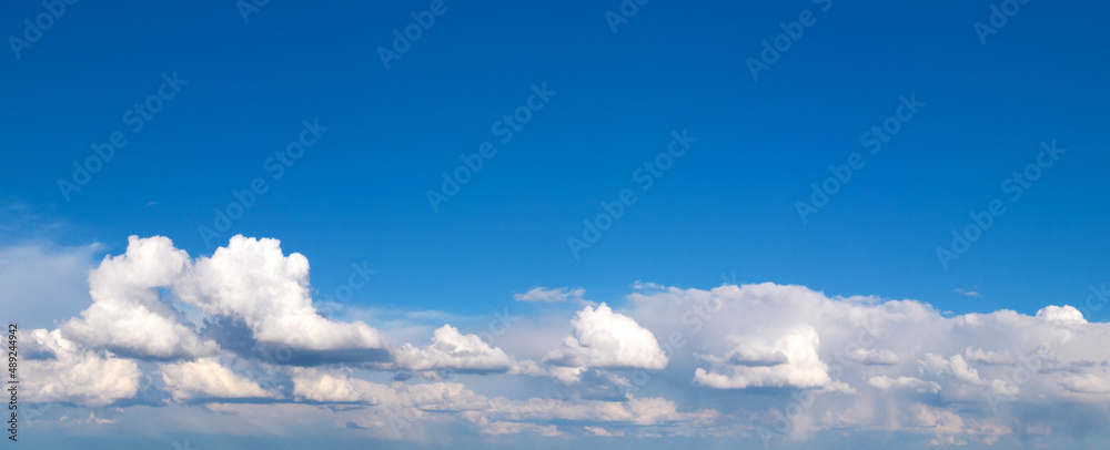 Fototapeta premium blue sky background with tiny clouds