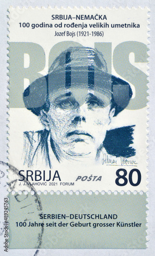 Cancelled postage stamp printed by Serbia, that shows  Joseph Beuys, Birth centenary, circa 2021. photo