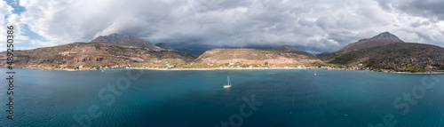 Fototapeta Naklejka Na Ścianę i Meble -  Greece, Peloponnese. Laconia , aerial panorama. Mani bay and coast under heavy cloud sky