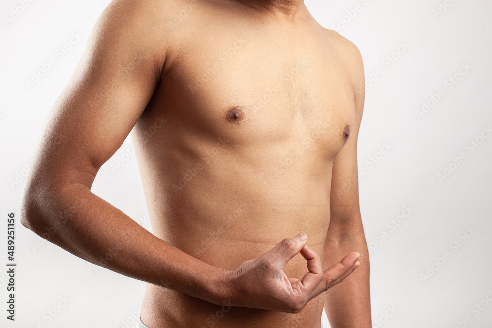 shirtless fit man showing gyan mudra meditation gesture shirtless fit man showing gyan mudra meditation gesture