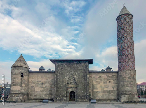 Turkey, historical Erzurum Seljuk period mosque. Stone minaret. Authentic engravings on the wall. 