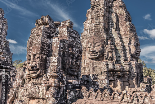 Sacred faces of ancient kings of Cambodia in Bayon temple of Angkor complex, Siem Reap, Cambodia photo