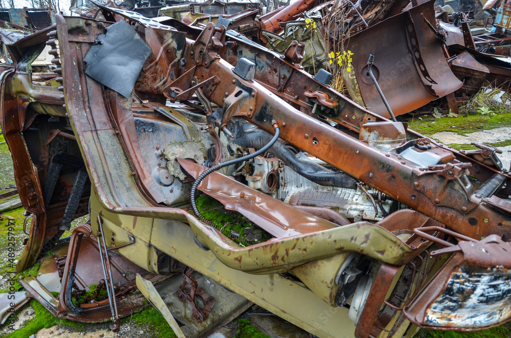 Piles of old rusty soviet crushed trucks in scrap metal yard. Car recycling Piles of old rusty soviet crushed trucks in scrap metal yard. Car recycling