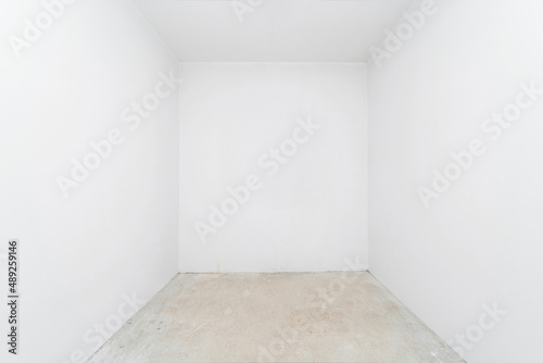 Empty space of a white room. Walls for apartment renovation.