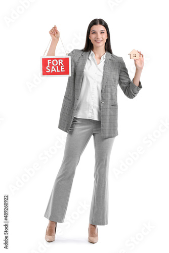 Smiling female real estate ...