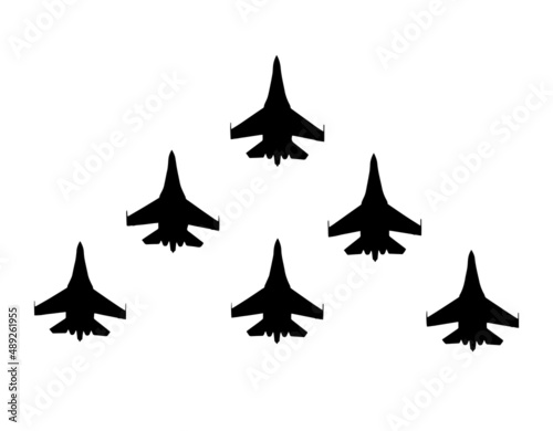 Aerobatic team of fighter aircrafts. Vector silhouette